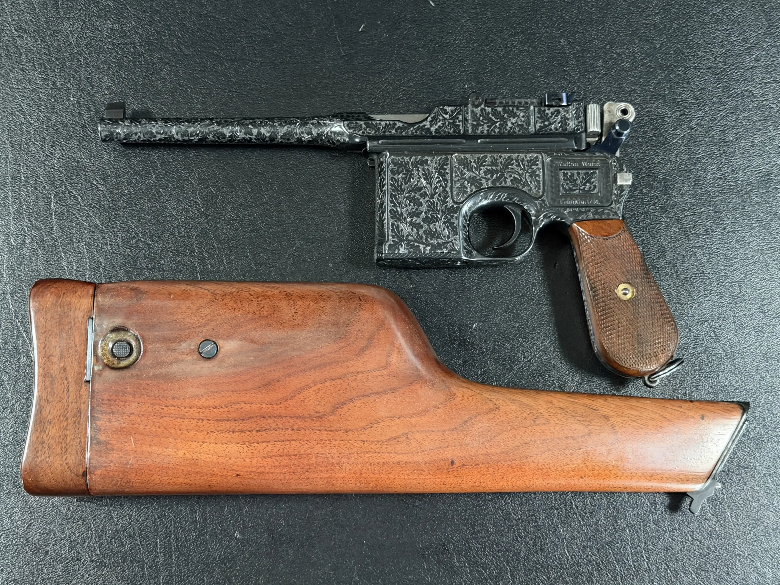 Engraved Mauser C96 Broomhandle With Shoulder Stock photo 2