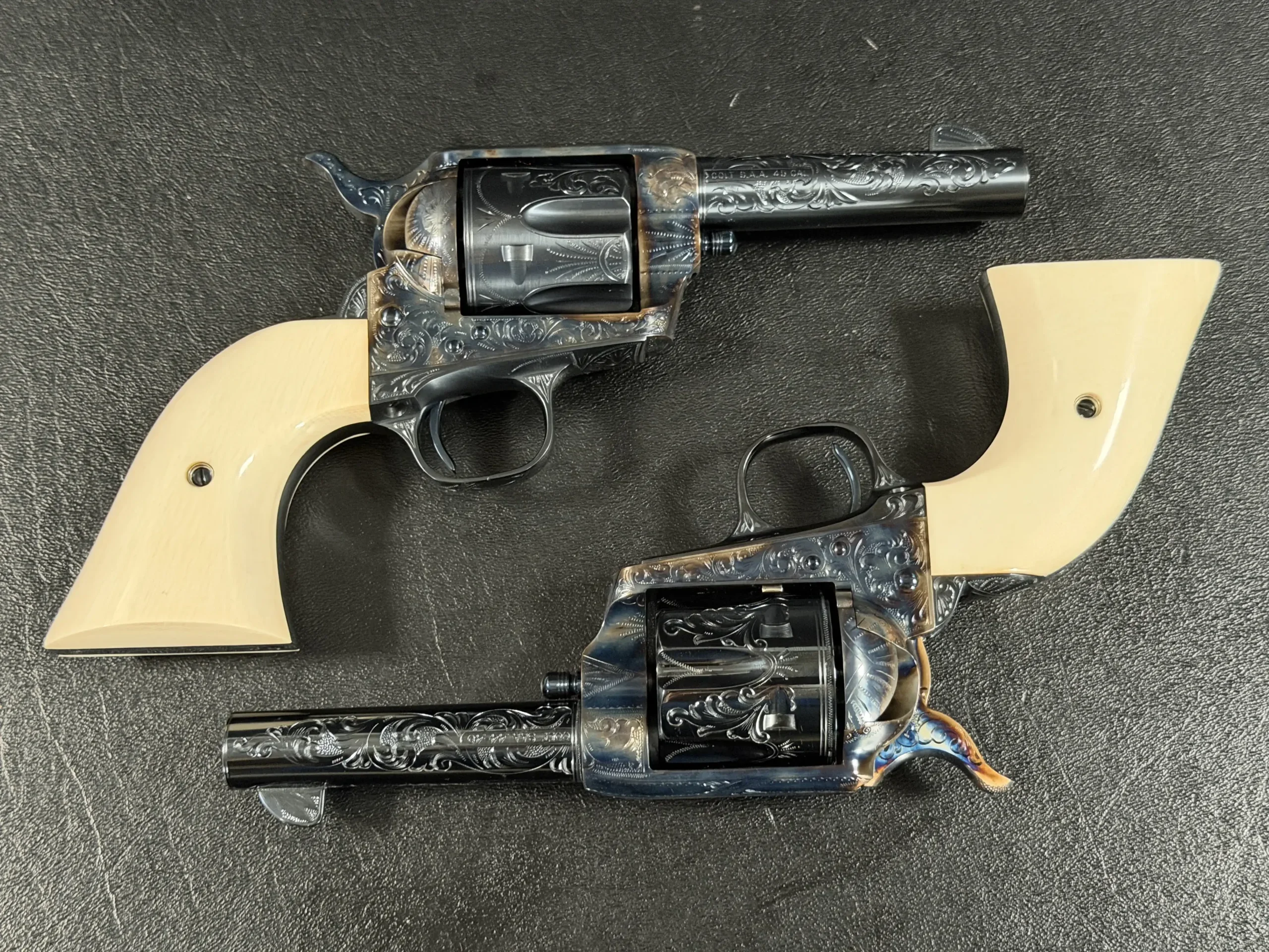 Cased Pair of Engraved Colt 3rd Generation Storekeeper Single Action Army Revolvers photo 6
